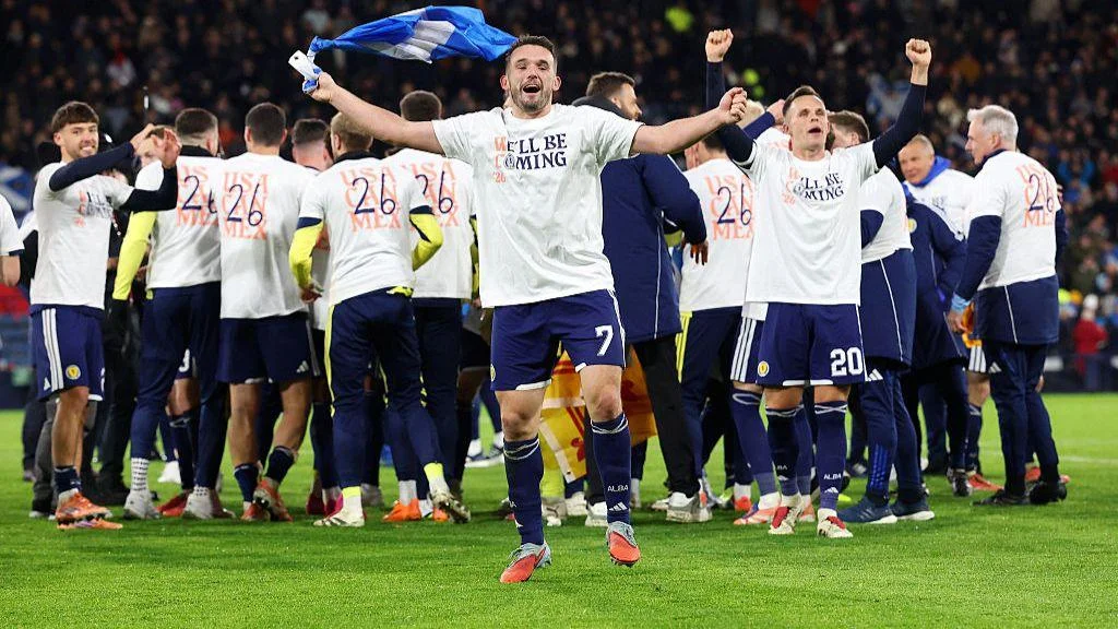 John McGinn of Scotland celebrates after the team's victory during the FIFA World Cup 2026 qualifier match between Scotland and Denmark.
