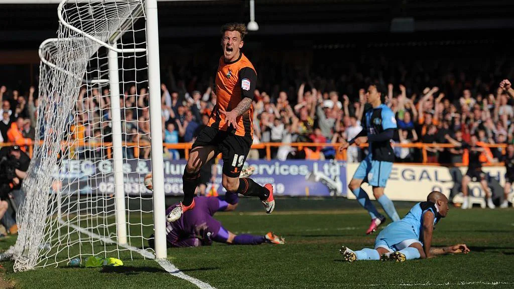 Jake Hyde celebrates his winner against Wycombe